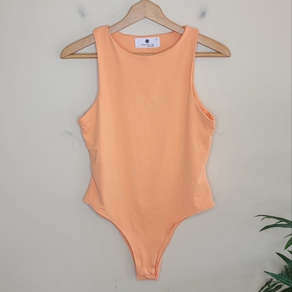 Everyday Chic Boutique | Better Than Ever Orange Bodysuit Size Large - Picture 1 of 5